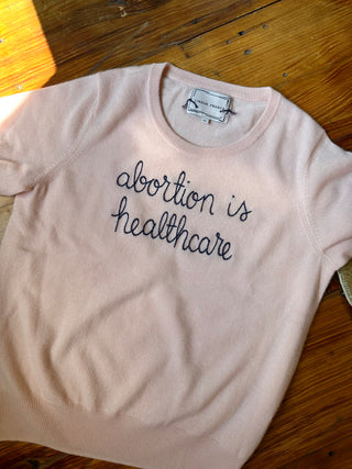 “abortion is heathcare” Crewneck  Donation10p Pale Pink XS 